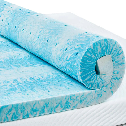 Image of the King Memory Foam Mattress Topper, featuring a blue cooling gel-infused surface designed for optimal comfort and breathability, displayed on a stylish king-sized bed.