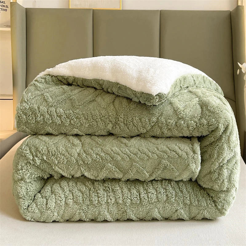 A beautifully styled bed featuring the Emerald Green Weighted Blanket, showcasing its plush coral fleece texture that delivers ultimate warmth and comfort. The vibrant green hue brings a refreshing and lively touch to the bedroom decor. With its anti-pilling feature, this blanket ensures durability and long-lasting elegance, perfect for creating a cozy sanctuary.