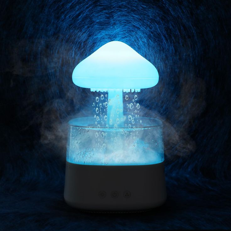 image of a rain cloud diffuser surrounded with rain mist